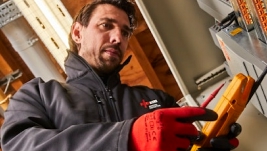 NICEIC electrician carrying out testing